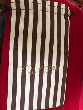 henri bendel Brown & White Vertical Stripe Drawstring Pouch with Gold Logo
